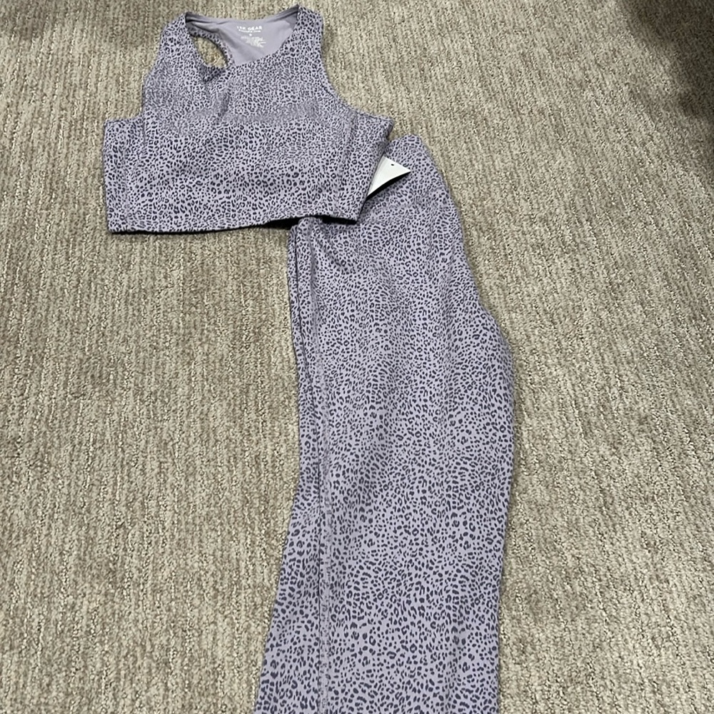 Workout set- top with built in bra and leggings. Size small, never worn